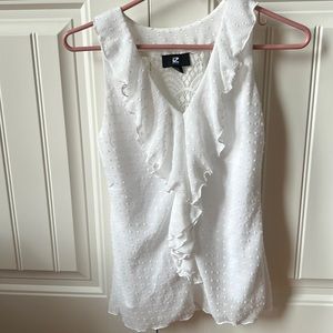 Cute ruffle front dot sleeveless blouse